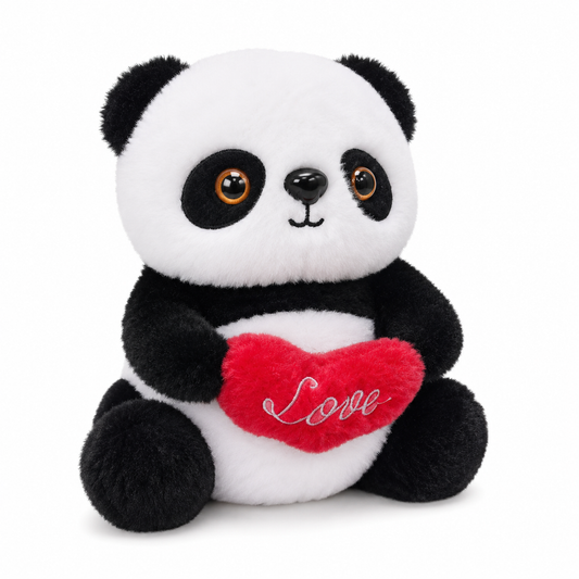 Panda plush toy holding a red love heart, studio photo