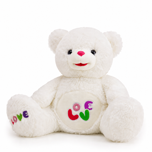 Large white teddy bear with embroidered Love patch, studio photo