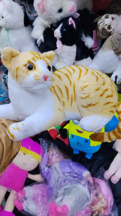 White long fur plush toy held in hand for size reference